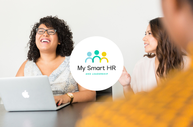 A Team Working And The My Smart Hr Logo